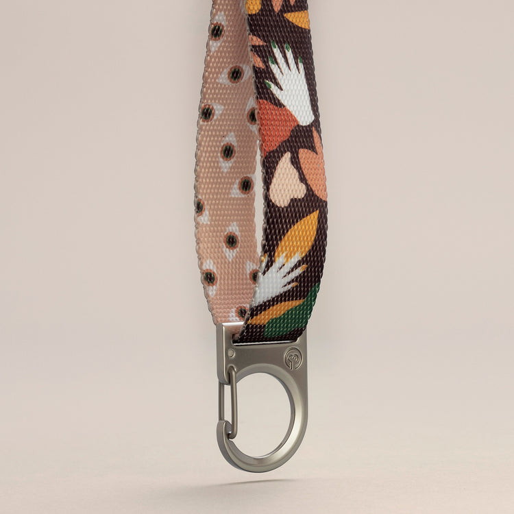 Fur Sie Clemens designer dog collar featuring a double-sided, abstract earthy-toned pattern with a silver wire-gate locking carabiner