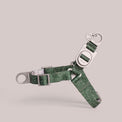 Green Fur Sie Sabin anti-pull harness on a light gray background