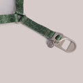 Close-up of the Sabine dog harness metal lock and straps