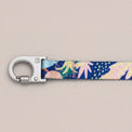 Fran dog leash with floral botanic pattern on a light gray background