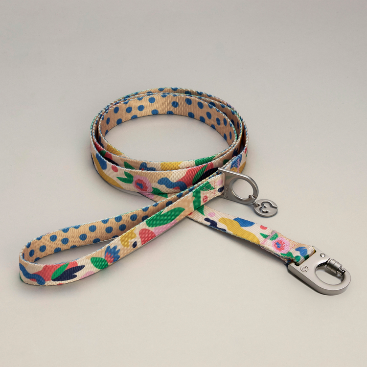 Gaston dog leash with floral and polka dot pattern on a light gray background