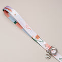 Matteo dog leash handle with soft pastel abstract pattern on a light neutral background