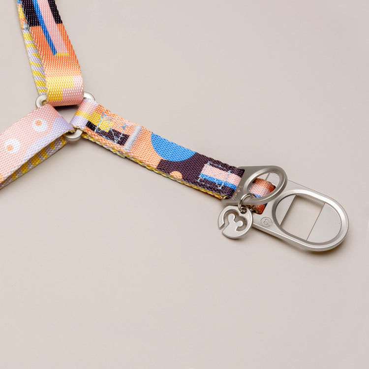 Close-up of the Una dog harness metal clasp and D-ring